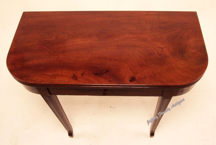 A George III mahogany 'D' shaped tea table c1800 
