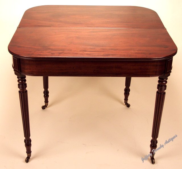 A mahogany tea table shown open c1825